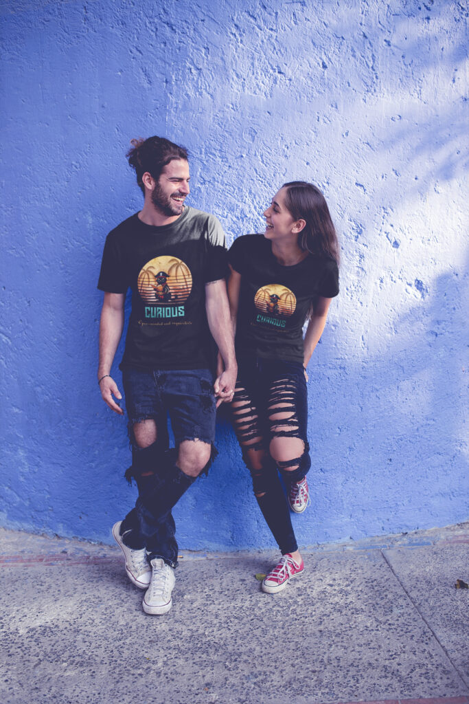 A couple wears Curious pirate cat deciphers ancient mysteries T-Shirts.